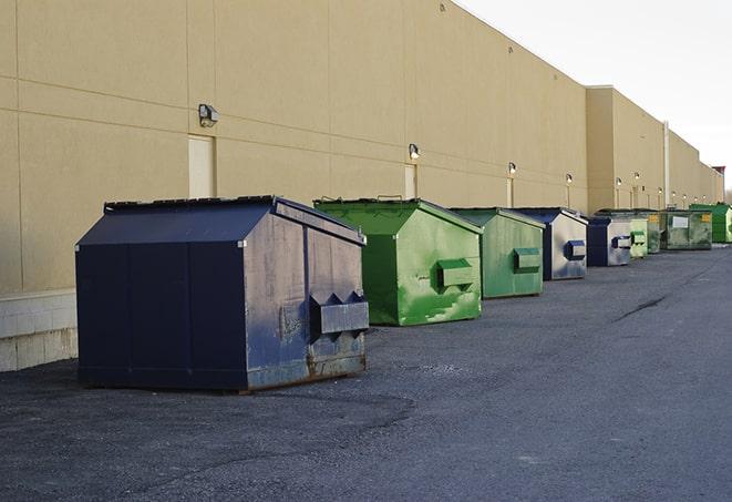 metal dump boxes positioned for construction cleanup in Encino